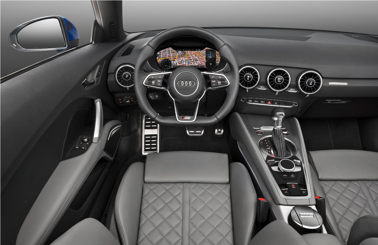Fahraufnahme    Farbe: Arablau Kristalleffekt    Verbrauchsangaben Audi TT Roadster:Kraftstoffverbrauch kombiniert in l/100 km: 6,8 - 4,3;CO2-Emission kombiniert in g/km: 154 - 114
