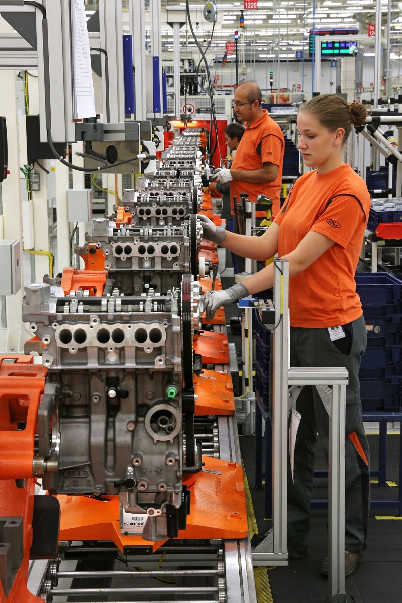 Ford workers assemble the 1.0-litre EcoBoost engine at the Cologne engine plant in Germany